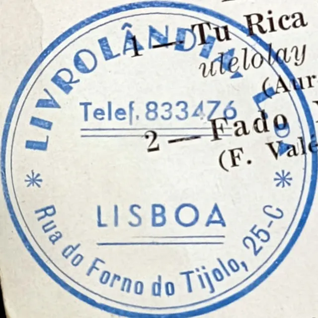 Carimbo da loja Livrolândia em disco de vinil